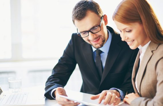 Teamwork Young businessman explaining ideas to his colleague at meeting
